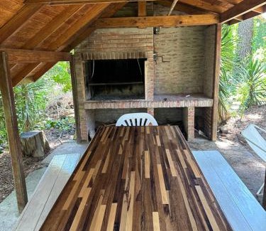 Valeria del Mar House | Forest Retreat with Quincho: Pet Friendly & Ocean View