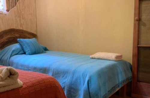 Villarrica House | Cozy Cabaña Entre Boldos: Pet-Friendly Family Retreat
