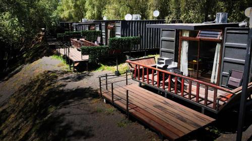 San Pedro de la Paz House | Cozy Cabaña Habitainer BordeRio 3 with Fireplace & Hot Tub