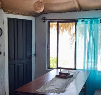 Mahahual Apartment | Discover Cabaña Ilean: Pet-Friendly Oceanfront Escape