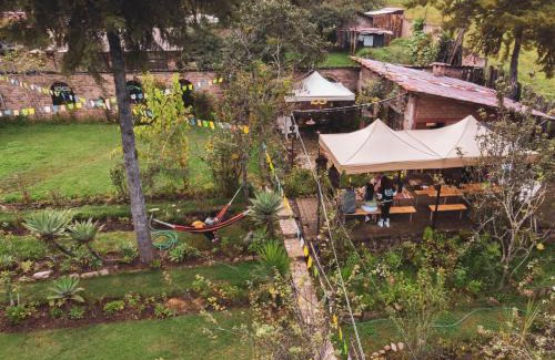 Banos del Inca House | Discover Cabaña Kinti Yuraq: Family and Pet-Friendly Stay