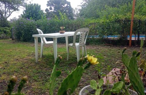 Villa Elisa Apartment | Cozy Cabin with Pool and Lush Garden Retreat