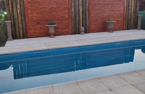 Lobos Apartment | Discover Cabaña Un Lugar en el Mundo Lobos - Poolside Retreat