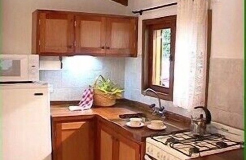 Villa General Belgrano Cabin | Experience Tranquility at Cabañas Am Bach with Pool & Spa