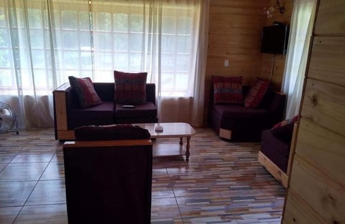 Caburgua House | Experience Cabañas Amanecer de Caburgua: Family-Friendly Retreat