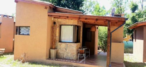Santa Rosa de Calamuchita Hotel | Discover Cabañas Sukha: Ocean View with Pool Access