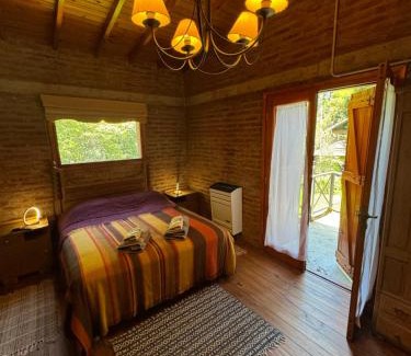 Bosque Peralta Ramos Cabin | Unforgettable Cabañas Arehue: Pet Friendly with Kitchen