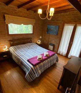 Bosque Peralta Ramos Cabin | Unforgettable Cabañas Arehue: Pet Friendly with Kitchen