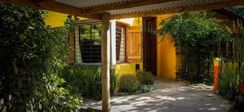 Bosque Peralta Ramos Cabin | Family-Friendly Cabañas Arenas del Faro with Hot Tub