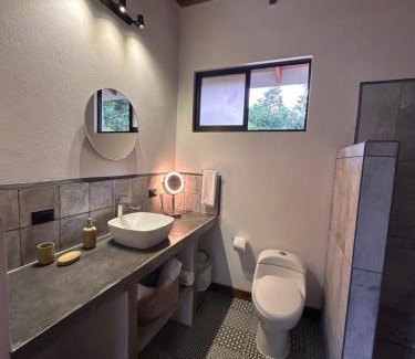 Bijagua Apartment | Discover Comfort at Cabañas Areno Lodge with Family-Friendly Amenities