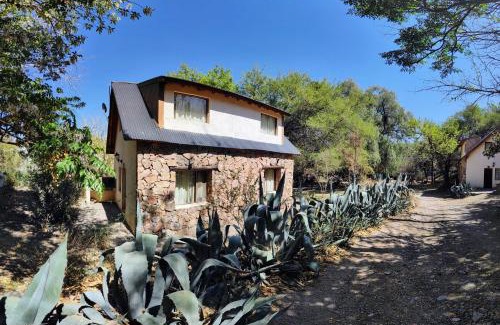 Capilla del Monte Ski Chalet | Discover Cabañas Budapest: Oceanfront Retreat with Pool