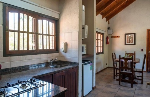 La Falda Cottage | Pet-Friendly Retreat at Cabañas El Eden with Pool & Spa