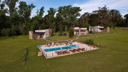 Tandil Apartment | Top-Rated Cabañas El Rincon with Oceanfront Pool Access