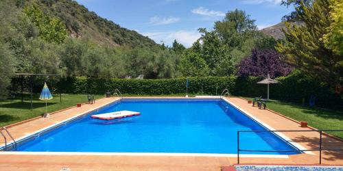 Jimera de Libar House | Discover Cabañas Jimera de Líbar: Family & Pet Friendly Retreat