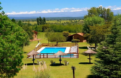 Villa General Belgrano Resort | Discover Cabañas Landhaus: Oceanfront & Family-Friendly Stay