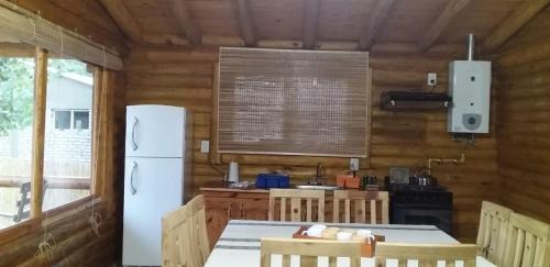 Tunuyan House | Experience Cabañas Las Acacias with Ocean Views & Pool