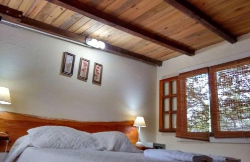 La Granja Hotel | Cozy Cabañas Lignum: Family-Friendly Tiny House with Pool