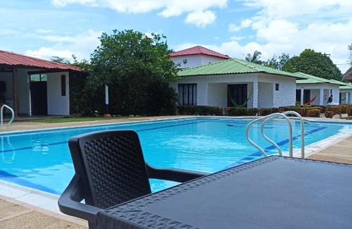 Apiay Hotel | Family-Friendly Cabañas LLano Lindo Apiay with Ocean View