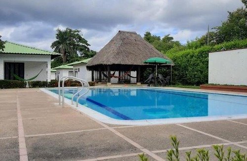 Apiay Hotel | Family-Friendly Cabañas LLano Lindo Apiay with Ocean View