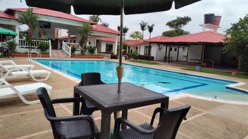 Apiay Hotel | Family-Friendly Cabañas LLano Lindo Apiay with Ocean View