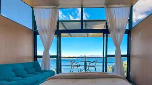 Tota Apartment | Experience Cabañas los Sauces: Pet Friendly with Ocean Views