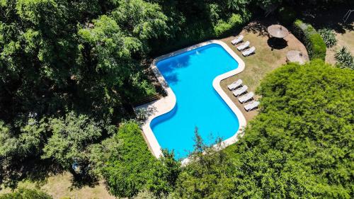 Villa General Belgrano Cabin | Pet-Friendly Cabañas Mirasoles with Pool & Child Amenities