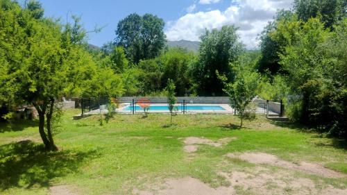 Potrero de los Funes Cabin | Exceptional Cabañas OliBer with Pool & Family Amenities