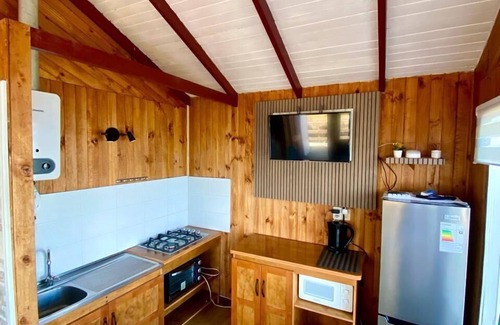Nercon Cabin | Pet-Friendly Cabañas Palafitos Dalmacia with Ocean Views
