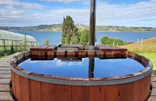 Castro House | Idyllic Cabañas Reflejo de Luna with Private Beach Access
