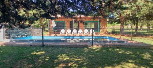 Los Reartes House | Discover Cabañas UN LUGAR: Family & Pet-Friendly Retreat