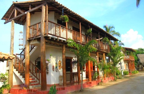 Palomino Apartment | Oceanfront Cabañas Vacacional Coveñas with Spa & Family Amenities