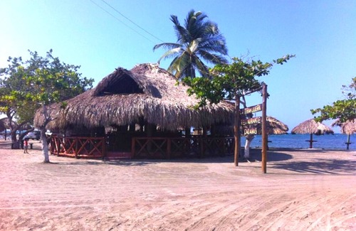 Palomino Apartment | Oceanfront Cabañas Vacacional Coveñas with Spa & Family Amenities