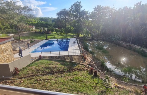 Melgar Cabin | Inviting Cabañas Vacacionales Pa Lo Alto with Pool & Spa
