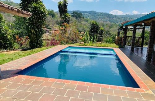 San Gil Apartment | Explore Cabañas Villa Bayona: Pet-Friendly Family Retreat