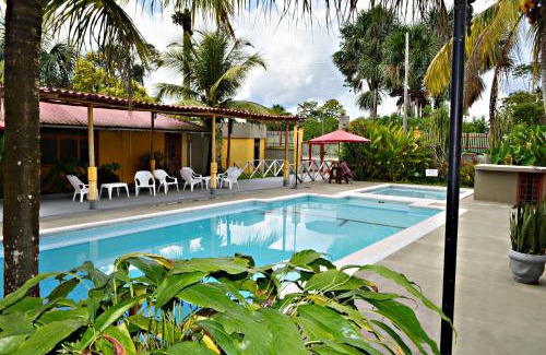 Leticia Hotel | Relaxing Retreat at Cabañas Yakuruna: Pool & Dining Awaits