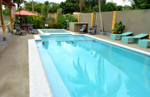 Leticia Hotel | Relaxing Retreat at Cabañas Yakuruna: Pool & Dining Awaits