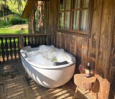 Rodeio House | Relax in Cabana Centenária Featuring a Hot Tub Retreat