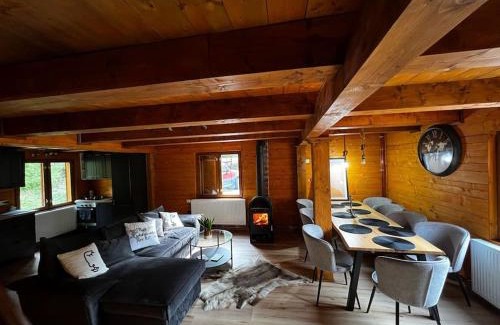 Poieni House | Discover Cabana Drăgana: Family-Friendly Retreat with Hot Tub