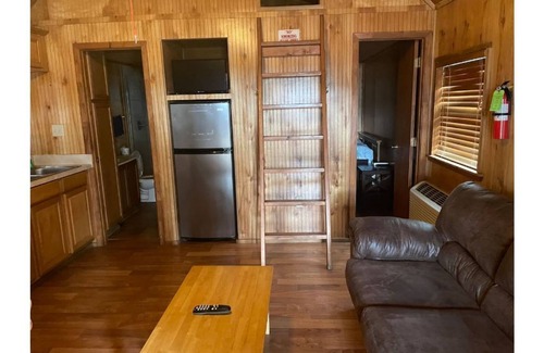 Negreet Cabin | Unwind at Cabin 11 in Tranquility Bay Resort with Pool