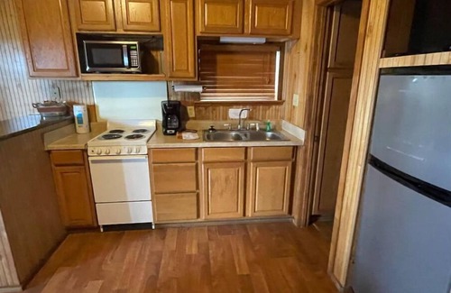 Negreet Cabin | Unwind at Cabin 11 in Tranquility Bay Resort with Pool