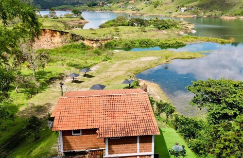 Guatape Cabin | Cabin in Guatape with Jacuzzi and dam.