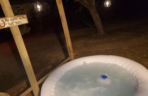 Bandera House | Cozy Cabin Getaway with Hot Tub Under the Stars