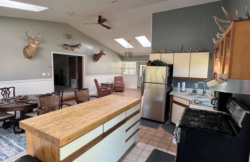 Wolverine House | Cozy Cabin in the Woods with Pool and Family Amenities