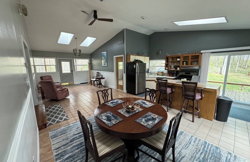 Wolverine House | Cozy Cabin in the Woods with Pool and Family Amenities