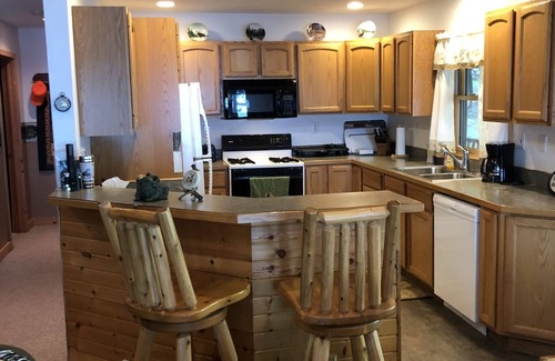 Drummond Cabin | Inviting Cabin Retreat with Waterfront Views & Hot Tub