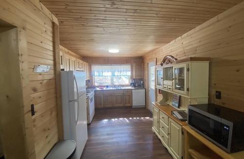 Jamestown Cabin | Idyllic Cabin on the Water with Kayaks, Hot Tub & Views