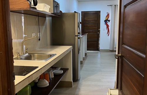 Puerto Carrillo Hotel | Guest Rated: Cabinas el Colibri with Pool & Spa Amenities
