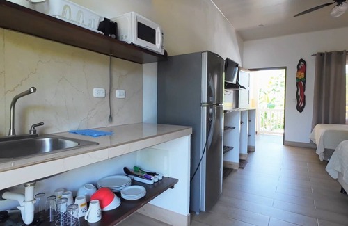 Puerto Carrillo Hotel | Guest Rated: Cabinas el Colibri with Pool & Spa Amenities