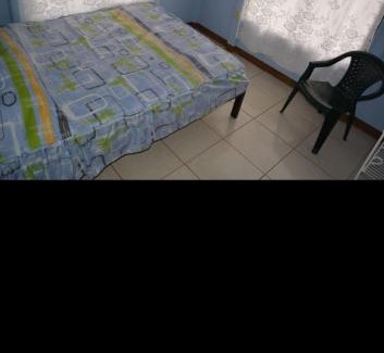 Rio Cuarto de Grecia Apartment | Family-Friendly Retreat at Cabinas Finca La Amistad