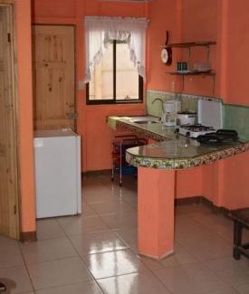 Rio Cuarto de Grecia Apartment | Family-Friendly Retreat at Cabinas Finca La Amistad